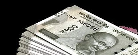 Rupee clocks 1st gain in four days, up by 14 paise against USD