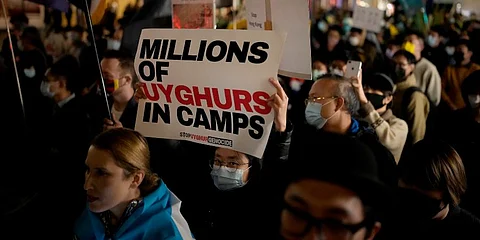 Demonstrators supporting Tibetans, Uyghurs and Hong Kongers take part in a protest against the Chinese Communist Party in London. (File Photo | AP)