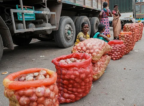 Tomato, onion growers in Karnataka in tears over price crash