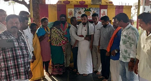 Shankar and his family go through the 'Ghar wapsi' ritual in Karatagi village of Koppal (Photo | Express)