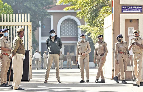 Security personnel outside the special court in Ahmedabad on Tuesday. (Photo | PTI)