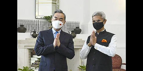 External Affairs Minister S. Jaishankar with China's Foreign Minister Wang Yi, during their meeting, at Hyderabad House.(Photo | PTI)