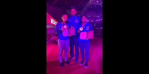 Sarita Mor (left), coach Jitender Yadav and Sushma Shokeen 