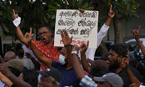 National People's Power supporters shout slogans during a protest in Colombo, Sri Lanka, Saturday, May 7, 2022. (Photo | AP)