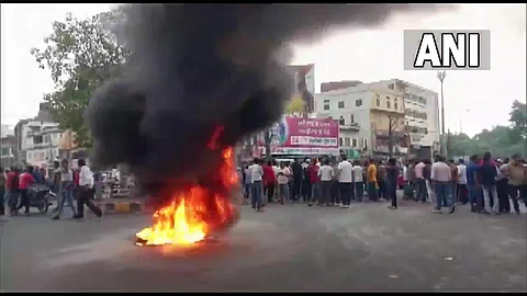 Locals protest after miscreants beheaded a man for supporting Nupur Sharma in social media post. (Photo | ANI Twitter)