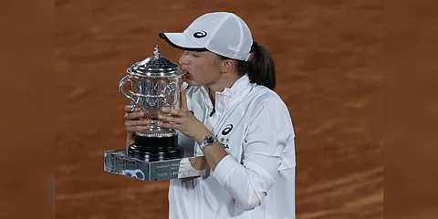 Poland's Iga Swiatek kisses the cup after defeating Coco Gauff of the U.S.in their final of the French Open tennis tournament at the Roland Garros stadium Saturday, June 4, 2022 in Paris. (Photo | AP)