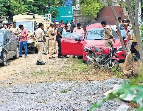 Clues team collects samples and examines the Mercedes at the Jubilee Hills police station in Hyderabad on Sunday