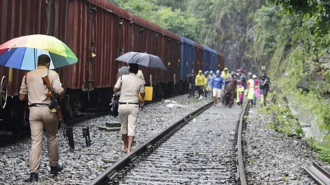 The RPF officials sending back a group of tourists at Dudhsagar railway station.