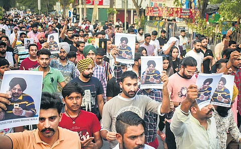 Youth in Haryana take out a candle light march to pay tribute to Moosewala. (File photo | PTI)