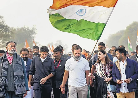 Rahul Gandhi with former MP Deepender Singh Hooda and others during the Bharat Jodo yatra in Nuh. (Photo | PTI)