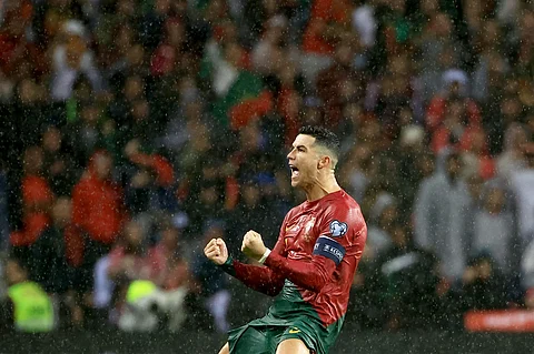 Portugal's Cristiano Ronaldo celebrates after scoring his side's third goal. (Photo | AP)