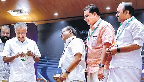 Chief Minister Pinarayi Vijayan with Jnanpith Award winner M T Vasudevan Nair who was bestowed with Kerala Legislature International Book Festival.