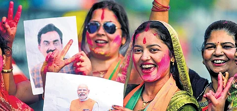 BJP workers celebrate the party’s performance, in Jabalpur on Sunday | PTI