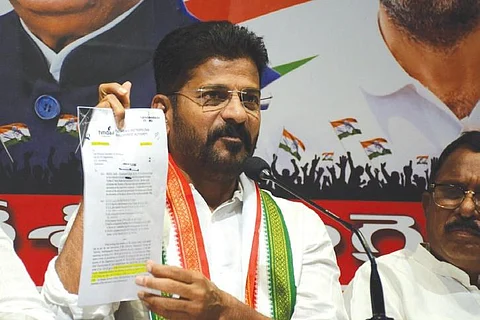 TPCC chief A Revanth Reddy addresses the media in Hyderabad on Tuesday