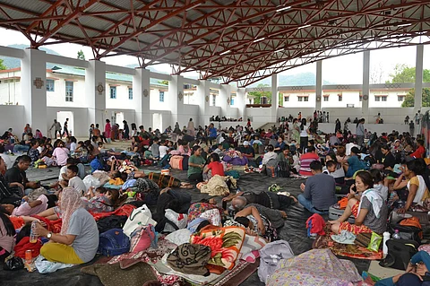 Tribals waiting to be evacuated to Lamka, Churachandpur from Imphal. (Photo | Special Arrangement)