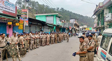 Security personnel deployed in Purola after the imposition of section 144 of the CrPC by Uttarkashi district administration after rumours spread regarding the abduction of a minor Hindu girl by two men.
