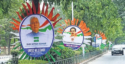 Flexes of UPA leaders come up across city, Girinath mum 