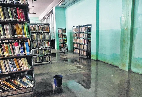 A leaky roof poses threat to the Devaneya Pavanar district central library in Anna Salai. The library has over one lakh books. (Photo | Express)