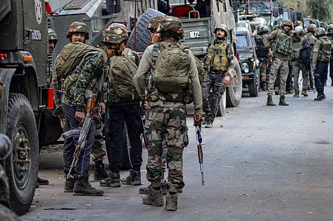 Security forces personnel at a search operation in the cordoned-off area during the ongoing encounter with terrorists in the Kokernag area, in Anantnag district. (PTI)