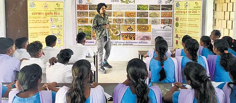 Biplab Mahapatra conducting an awareness camp in a school I Express