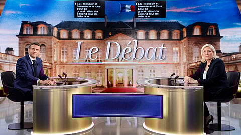 صورة من مناظرة بين إيمانويل ماكرون وماري لوبان