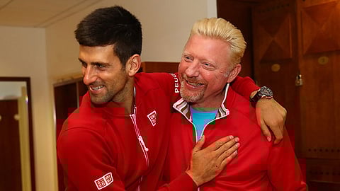 نوفاك ديوكوفيتش مع نجم التنس الألماني السابق بوريس بيكر