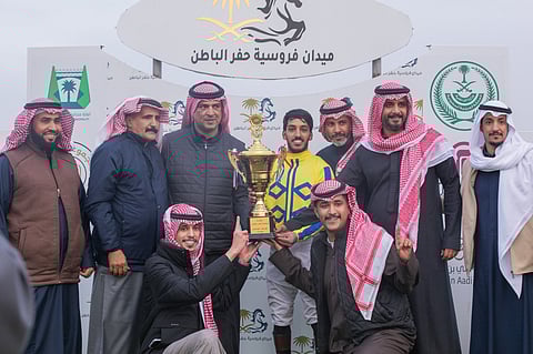 أحد الفائزين في السباق