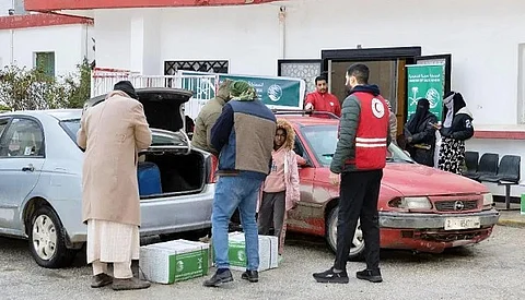 «إغاثي الملك سلمان» يوزع 2.416 سلة غذائية في درنة بليبيا
