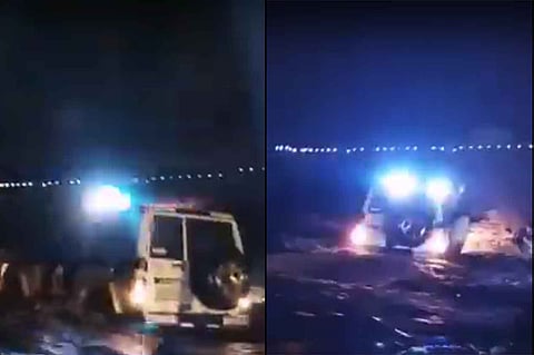 شاهد.. رجل أمن يغامر بنفسه لإنقاذ محتجزين وسط سيول أبو عريش