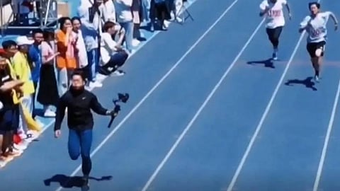 مصور صيني يفجر مفاجأة في تصوير سباق المضمار والميدان