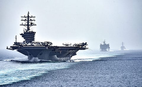 Aircraft carrier transits the Strait of Hormuz Credit to Flickr