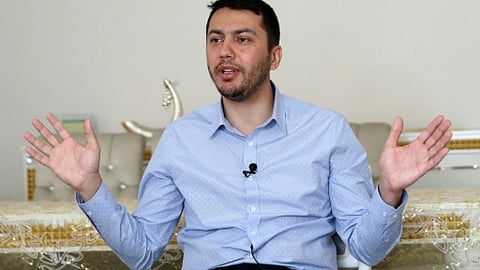 Freed Turkish-American scientist vows to clear name