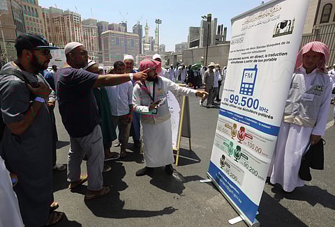 Saudi Arabia provide simultaneous translation for pilgrims within Smart HajjA team of trabnslators provides 24/7 interpretation services in English, French, Farsi, Malay, Hausa, Turkish, Chinese and Urdu ,the most widely-spoken language among Hajj pilgrims. / AFP / AHMAD AL-RUBAYE