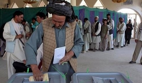 Afghan presidential vote held in relative calm, but turnout low