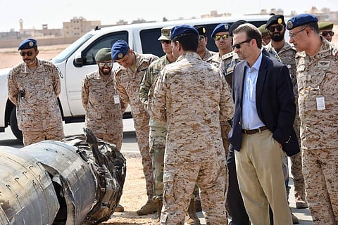 US official Watches the Remnants of Iranian Weapons Used by Houthi Militia