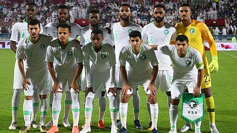 Saudi Arabia players pose for a team photo before the match at Abdullah bin Khalifa Stadium, Doha, Qatar. (Reuters)