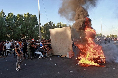Violence escalates in Iraq as Government Pushes to End Protests
