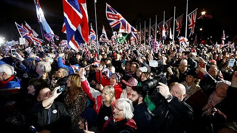 Flag-waving Britons stage noisy Brexit welcome outside parliament