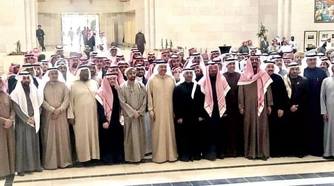 Dr. Nayef Al-Hajraf and Dr. Abdullatif Al-Zayani are surrounded by GCC general secretariat employees during the handover ceremony in Riyadh on Thursday