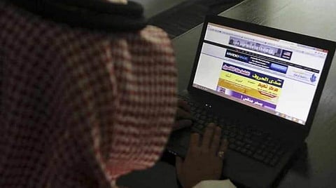 Image used for illustrative purposes. A Saudi man explores a website on his laptop in Riyadh on February 11, 2014. REUTERS/Faisal Al Nasser