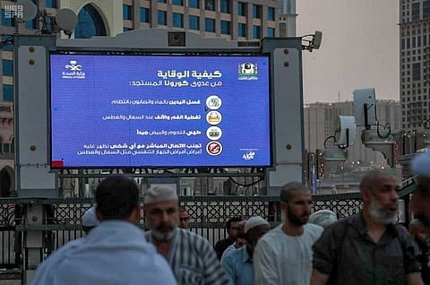 Screens of the Grand Mosque display precautions amid Coronavirus outbreak
