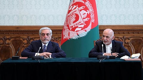 Afghanistan's President Ashraf Ghani and his rival Abdullah Abdullah attend a ceremony to sign a political agreement in Kabul, Afghanistan May 17, 2020. (Reuters)