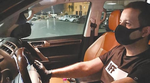 Hashem al-Qureshi delivering orders in Jeddah, Saudi Arabia.