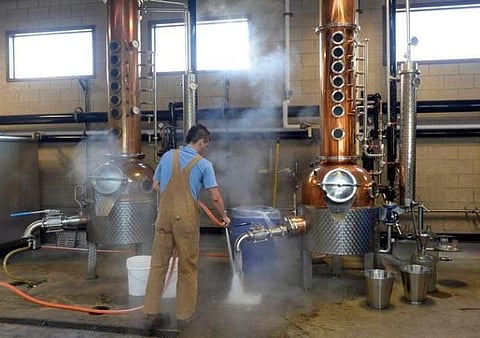 Seven expats held for running liquor distillery