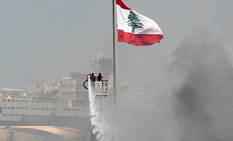 Smoke from Beirut port remnants of Thursday fire, 'no danger to city' - source