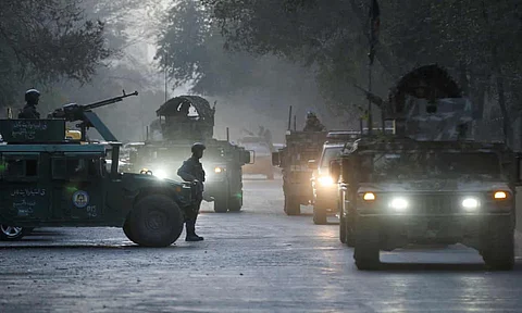 Afghan security forces at the site of the incident at Kabul University. Photograph: Omar Sobhani/Reuters