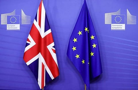 FILE PHOTO: Flags of the Union Jack and European Union are seen ahead of the meeting of European Commission President Ursula von der Leyen and British Prime Minister Boris Johnson, in Brussels, Belgium December 9, 2020. Olivier Hoslet/Pool via REUTERS