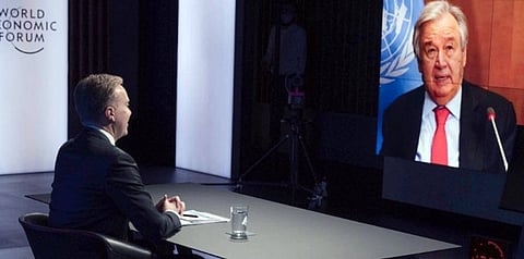 UN Secretary-General António Guterres (on screen) addresses the World Economic Forum Annual Meeting in Davos-Klosters, Switzerland.— courtesy World Economic Forum/Pascal Bitz