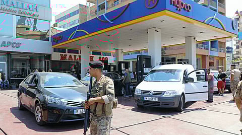 Lebanon's army has deployed at gas stations to stop fuel hoarding in the country after the central bank's decision to stop fuel subsidies sparked panic in the crisis-hit country ANWAR AMRO AFP