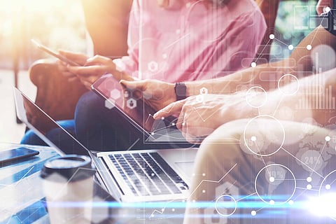 Global Strategy Virtual Icon Innovation Graph Interfaces.Young Coworkers Team Analyze Meeting Online Report Electronic Gadgets.Businessmans Startup Digital Project.Tablet Hands Laptop.Closeup Blurred